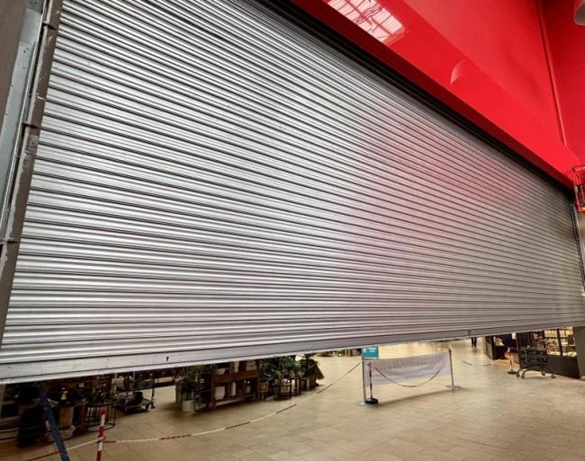 KLOZ - Restauration d´un grand rideau métallique